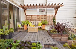 PAVERS 2 Elevate your outdoor space with deck seating and raised gardens, blending comfort and nature for a perfect retreat at home.