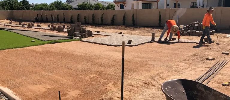 CGL crew building and compacting the aggregate base before turf goes down